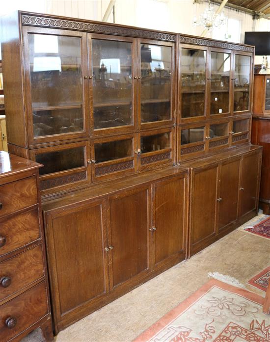 Pair of 1930s oak glazed bookcase cupboards